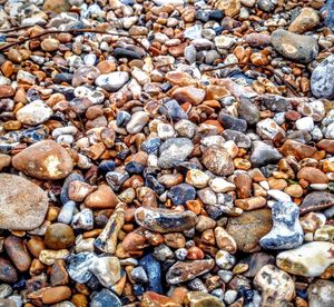 Full frame shot of pebbles at shore