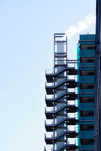 Low angle view of modern building against clear sky