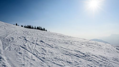 Scenic view of snow covered mountain against sky