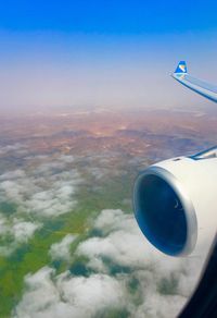 Low angle view of airplane flying in sky