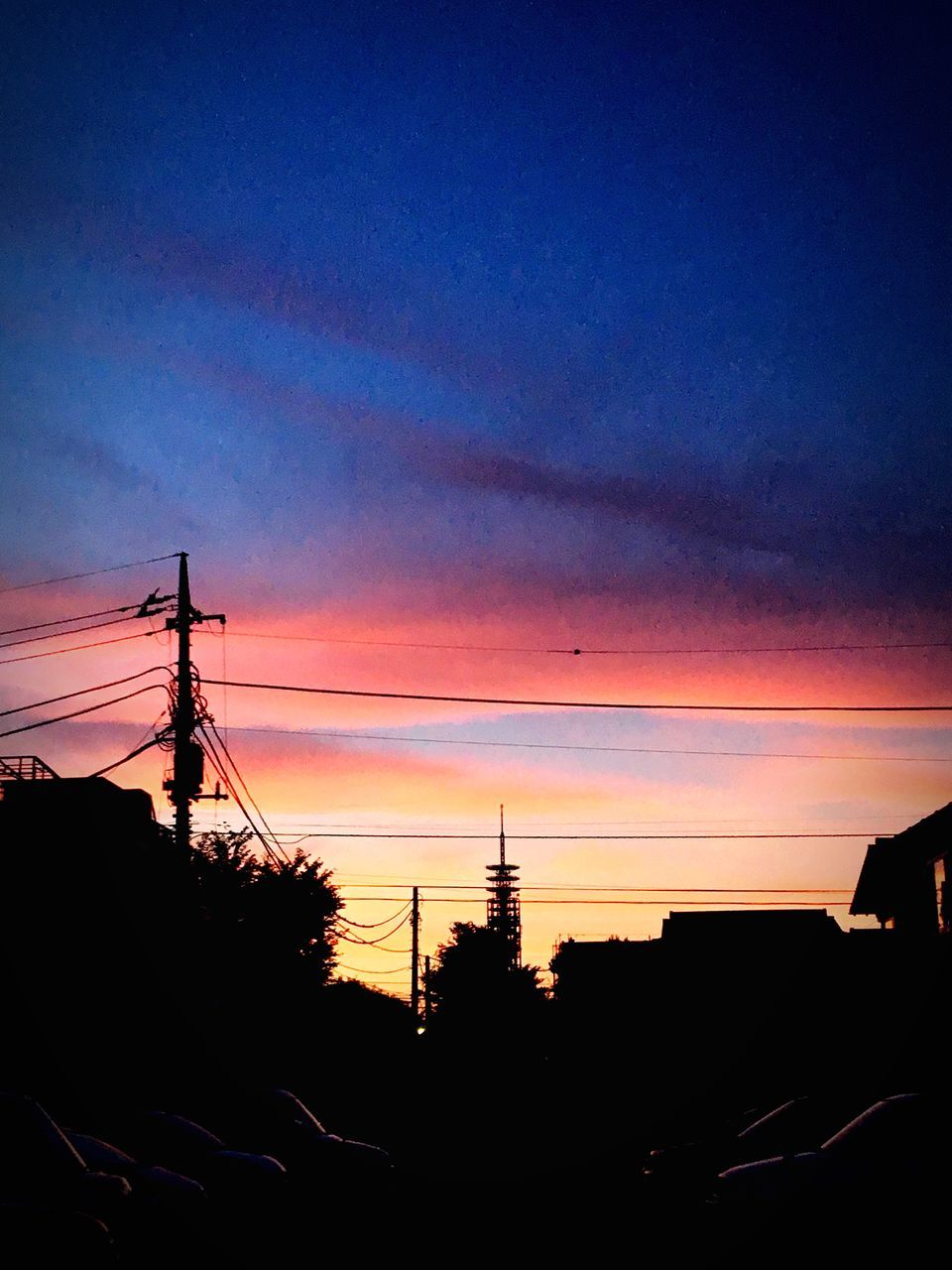 SILHOUETTE OF ELECTRICITY PYLON DURING SUNSET