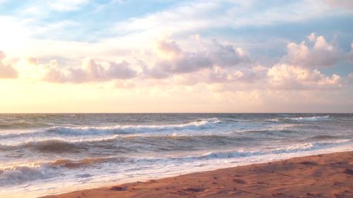 Scenic view of sea against sky during sunset