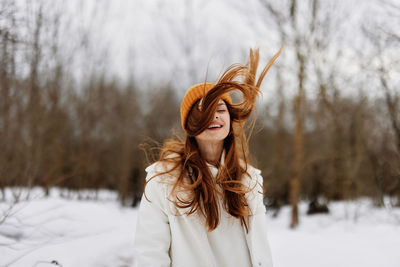 Rear view of woman wearing hat