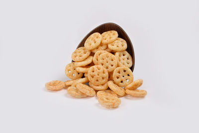 Close-up of cookies against white background