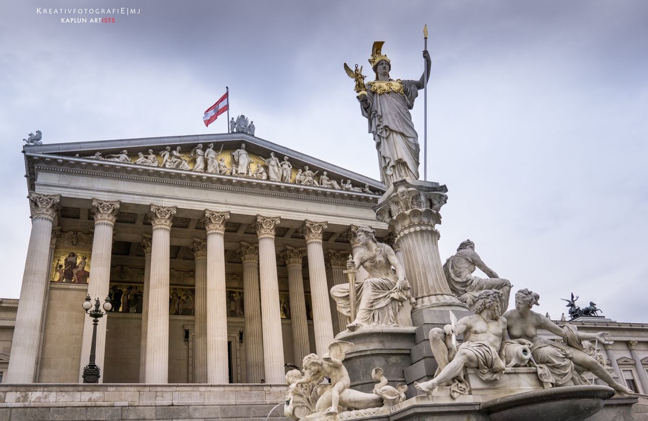 statue, sculpture, human representation, art and craft, art, creativity, low angle view, architecture, famous place, sky, travel destinations, built structure, animal representation, tourism, building exterior, travel, history, carving - craft product