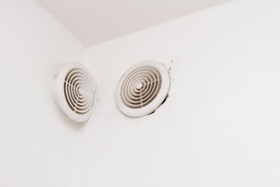 High angle view of spiral on white wall