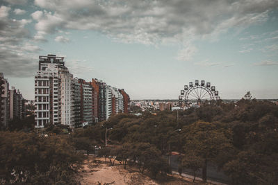 View of ferris wheel in city