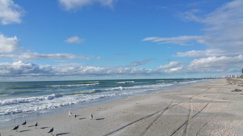 Scenic view of beach against sky