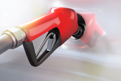 Close-up of car with petrol pump