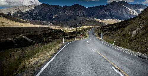 Road leading towards mountains