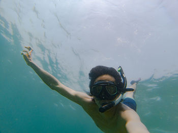 Man swimming in sea