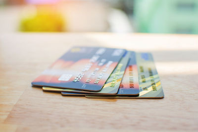 Close-up of credit cards on table