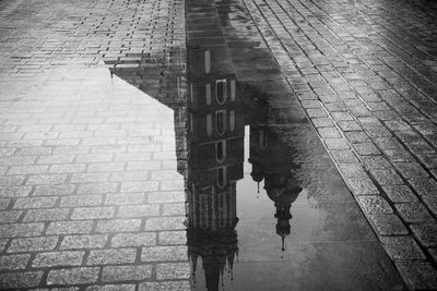 High angle view of puddle on street