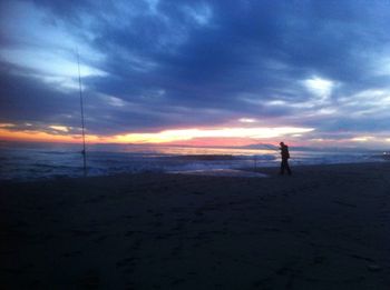 Scenic view of sea at sunset