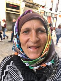 Close-up portrait of woman in city