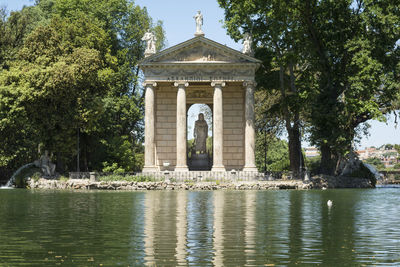 Statue in front of historical building