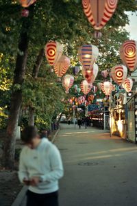 Rear view of man standing on street