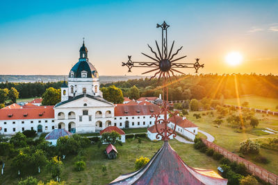 Panoramic view of buildings against sky during sunset