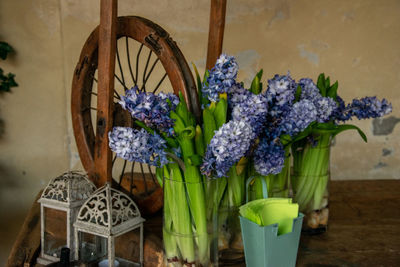 Close-up of purple flower pot on table