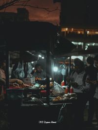 People in restaurant at night