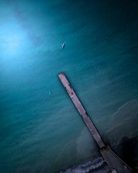 High angle view of sea against blue sky