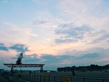 Low angle view of silhouette city against sky