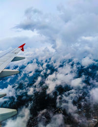 Low angle view of airplane flying in sky