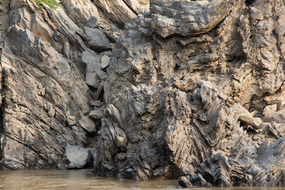 Full frame shot of rock formation in sea