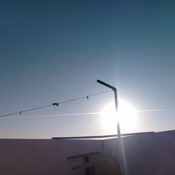 Low angle view of silhouette birds against sky