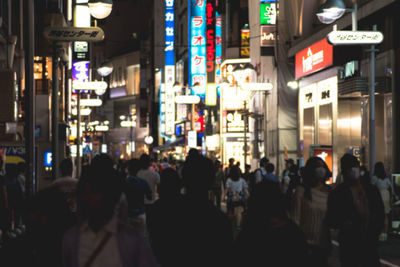 People in city at night