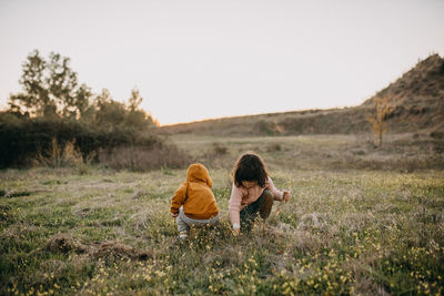 Cute kids playing on field