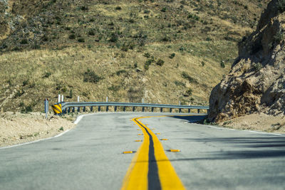 View of yellow highway on country road