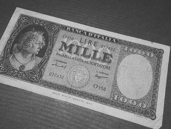 Close-up of coin on table