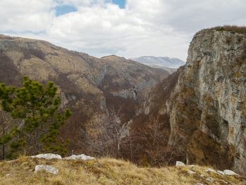 Scenic view of rocky mountains against sky