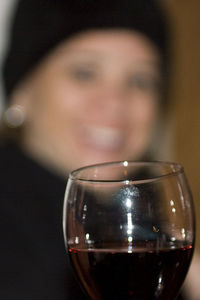 Close-up portrait of a mid adult man in glass