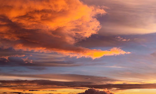 Low angle view of clouds in sky during sunset