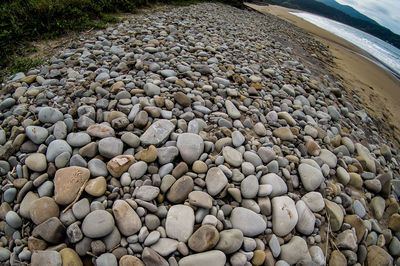 High angle view of stones on beach