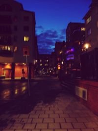 Illuminated street at night