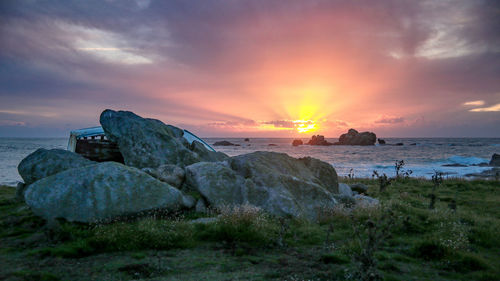 Scenic view of sea against sky during sunset