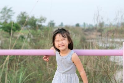 Happy girl on field