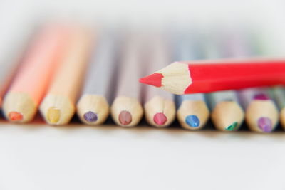 Close-up of colored pencils on table