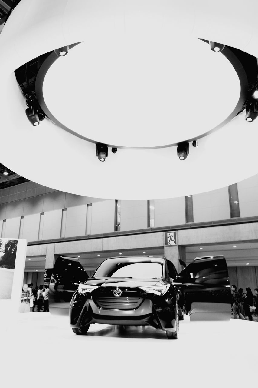 car, indoors, land vehicle, lighting equipment, transportation, illuminated, luxury, architecture, built structure, no people, modern, technology, day
