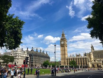 Group of people in front of buildings