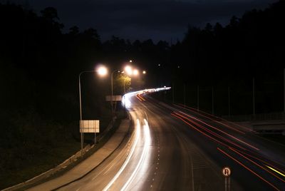 Light trails on road at night