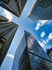 Low angle view of skyscraper against sky