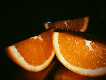 Close-up of orange slice on table