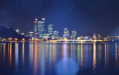 View of city lit up at night