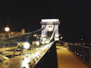 Bridge over river at night