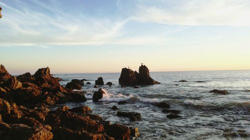 Scenic view of sea against sky during sunset