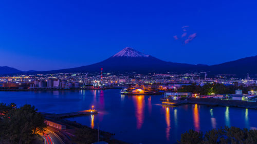 Fuji and the night view of mt. fuji and the factory seen from minato park in fujinokuni